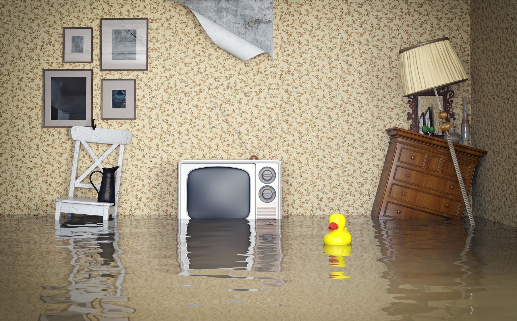 Living room floor covered in standing water after a flood